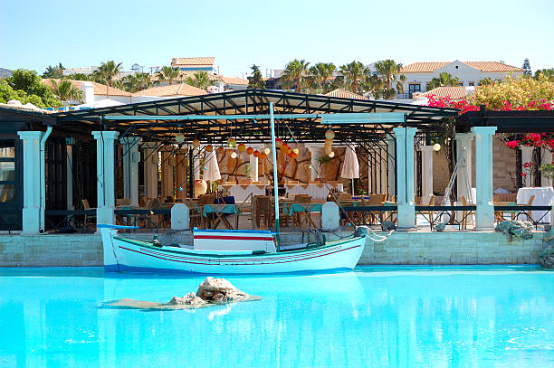 Sailboat in swimming pool at restaurant in luxury hotel, Crete, Greece