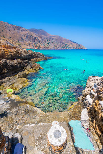 Amazing rocky beach of Ombros Gialos, Chania, Crete, Greece.